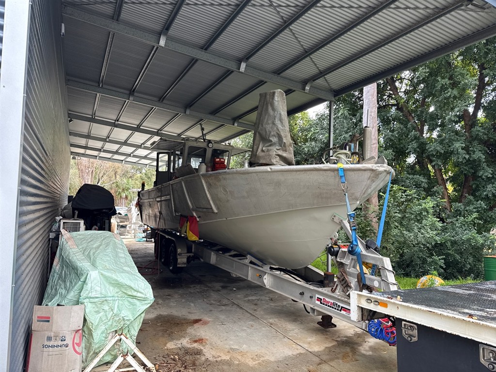 Aluminium boat on trailer during survey