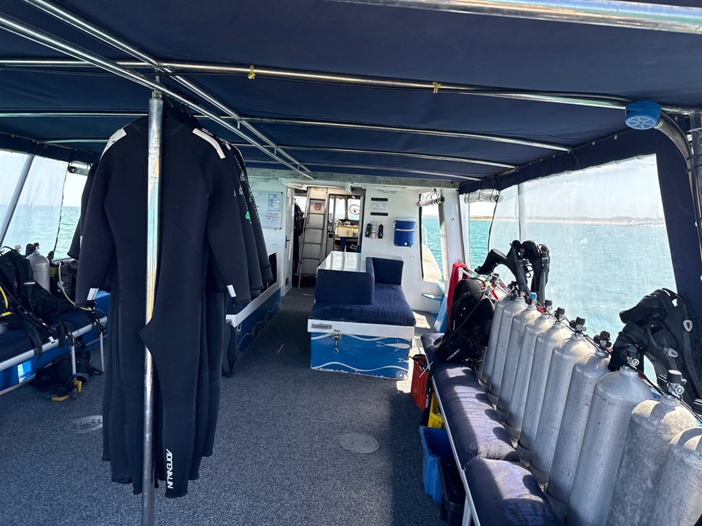 Interior of a dive boat with gear stowed