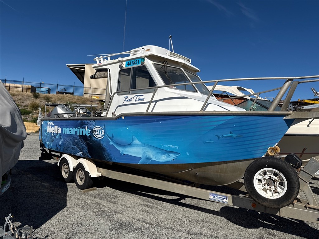 Trailer boat with wrap livery during survey